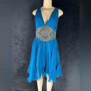 Chic Sleeveless Blue Dress with Embellished Waist